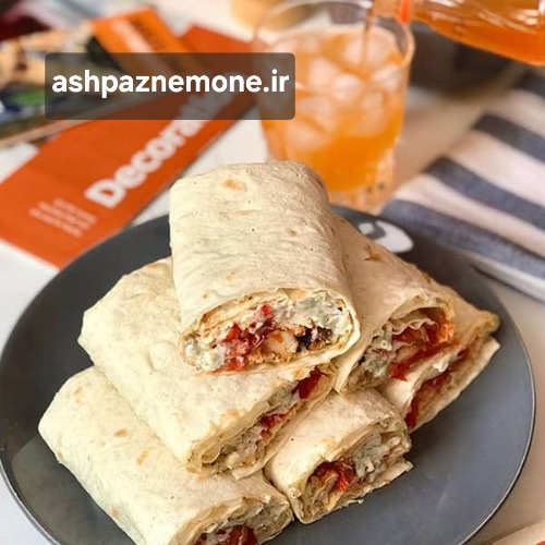 طرز تهیه ساندویچ لقمه مرغ با نان لواش نرم و خوش‌طعم به روش اختصاصی آشپز نمونه با بافتی آبدار و حرفه‌ای